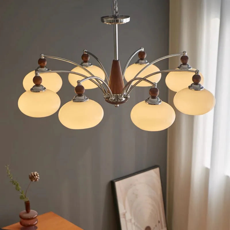 Persimmon glass chandelier with chrome and white lampshades in a middle ancient style