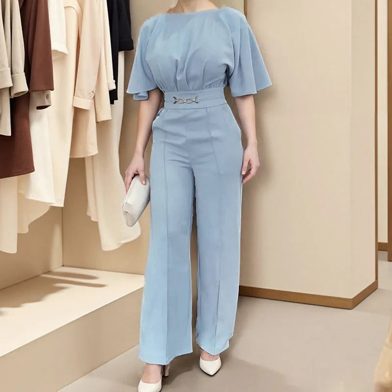 Blue casual suit with long sleeves and trousers, made from polyester fabric, available in sizes S to 3XL.