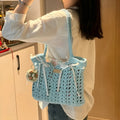 Handmade wool woven bag with floral pattern in bohemian style