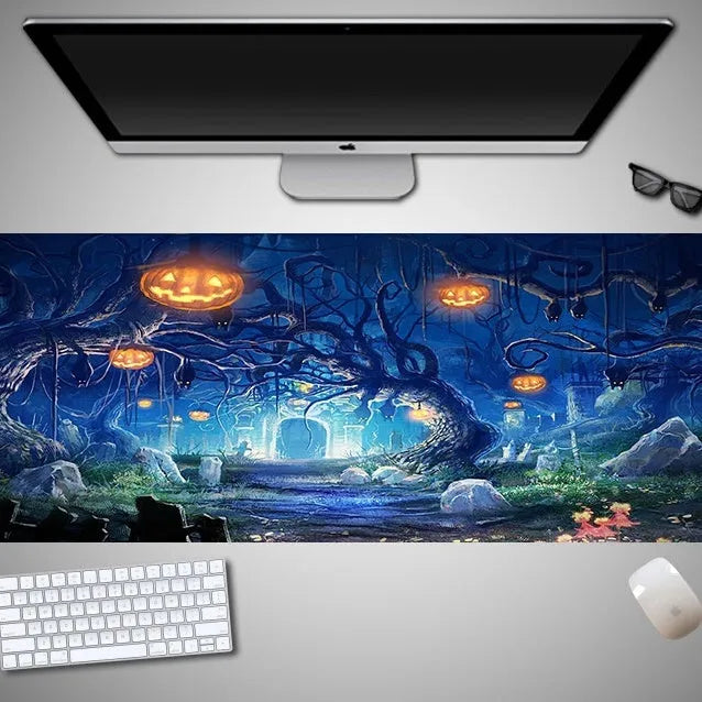 Oversized Halloween-themed mouse pad on desk with non-slip rubber cloth base and large surface area