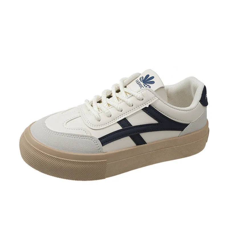 Brown and blue low-top casual board shoes with patent leather finish and round toe on a rubber sole.