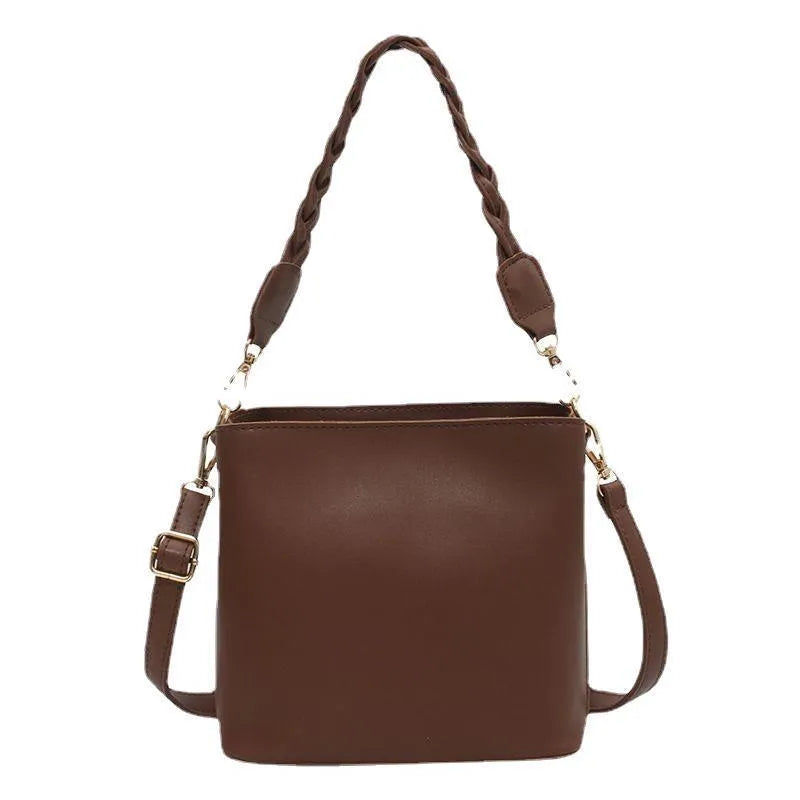 Fashion retro one-shoulder crossbody underarm bucket bag in woven PU with adjustable strap, shown in khaki colour.