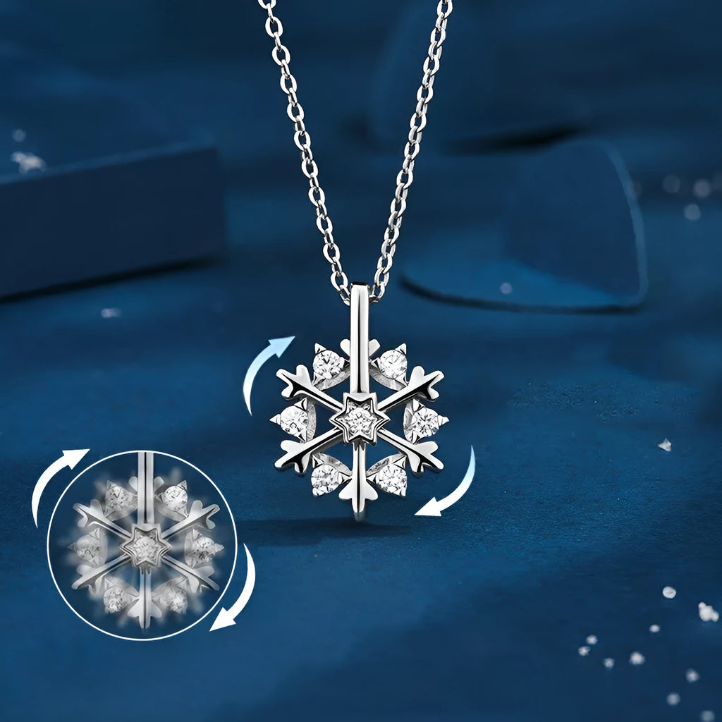 Rotatable S925 silver snowflake necklace for women with rhinestone detail, available in rose gold or white gold.