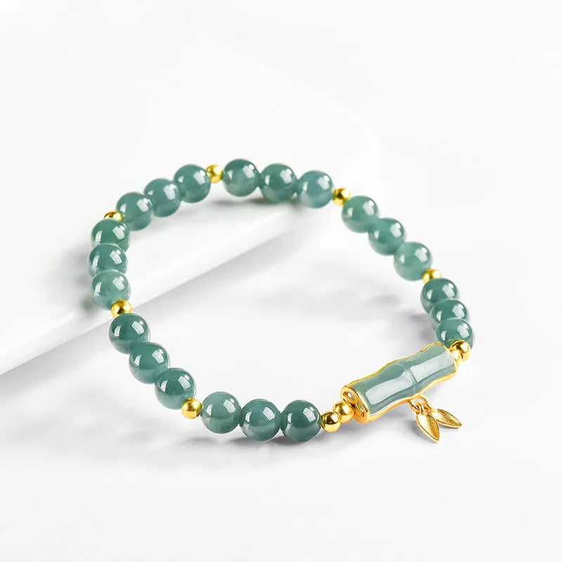 Women's high-rise bracelet made of S925 silver with blue water round beads.