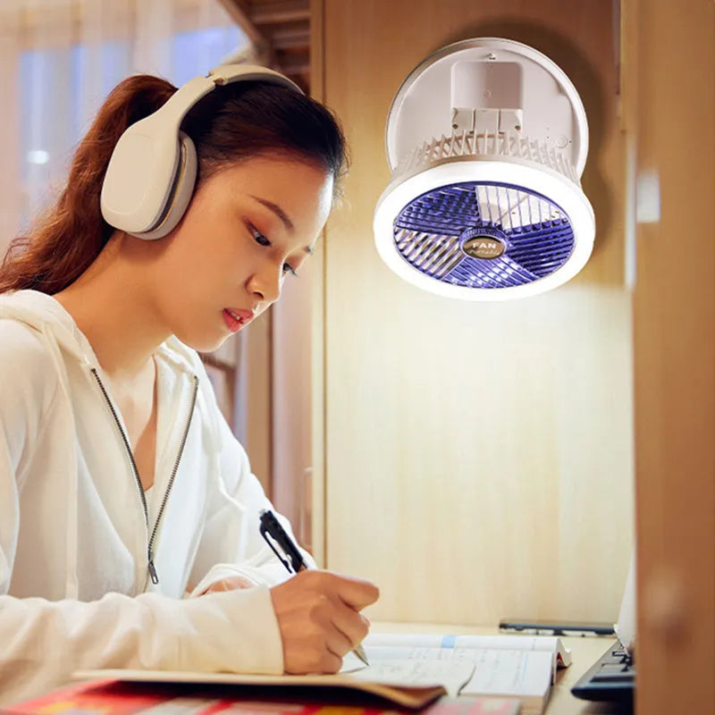 Blue foldable table fan with LED light showing 300° rotation angle and Type-C charging port
