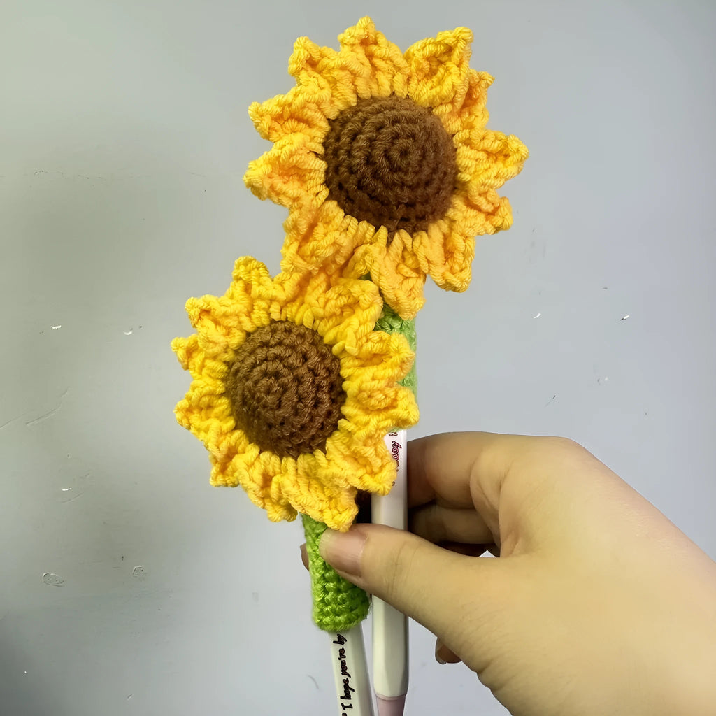 Hand-woven sunflower pen cover made from natural rattan and wheat straw in beige colour