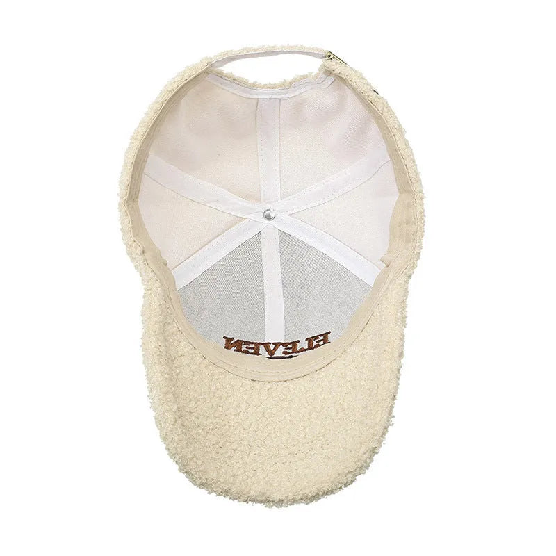 Adjustable winter baseball cap in polyester fabric with machine embroidery detailing