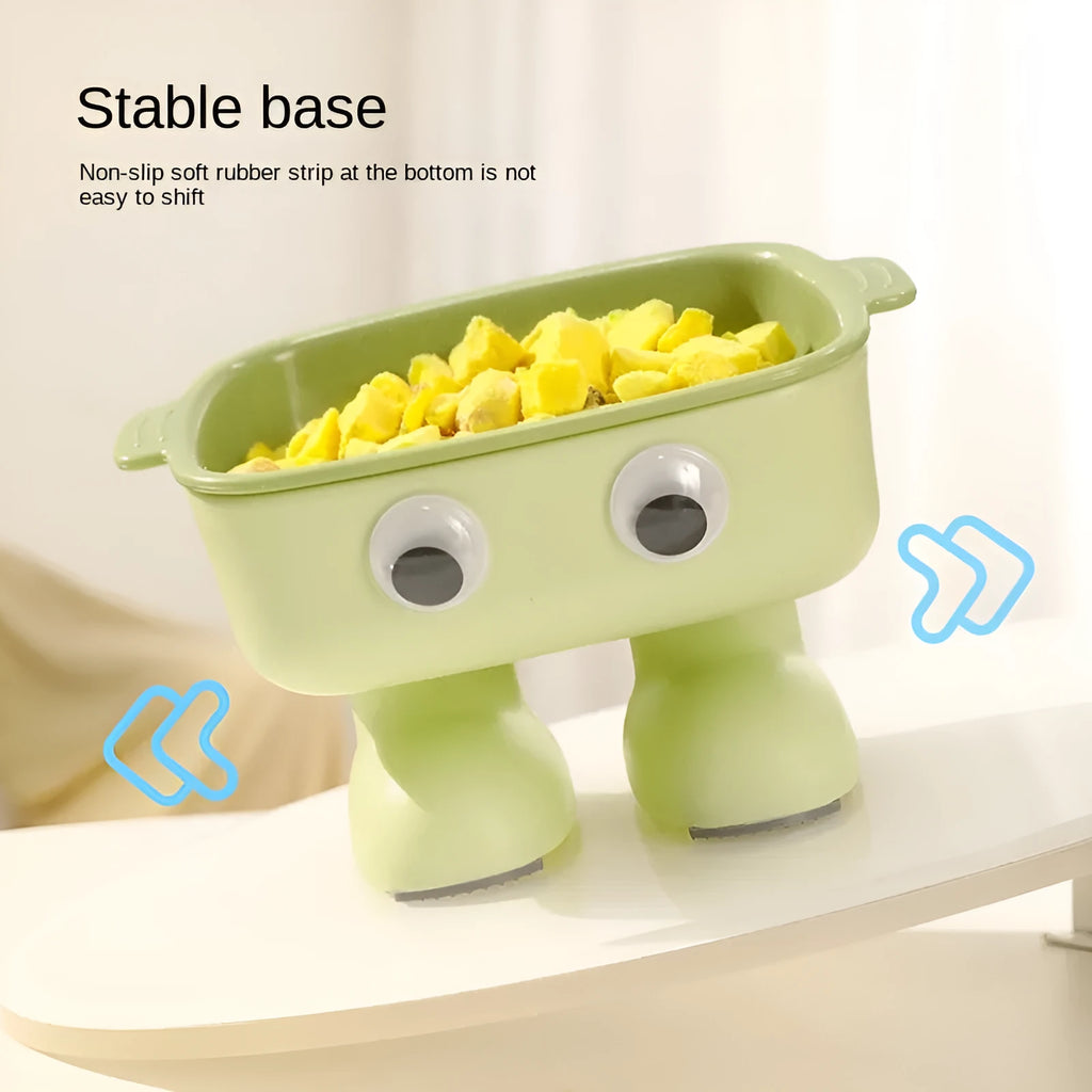 Green robot-shaped elevated cat bowl with tilted design and detachable inner food container