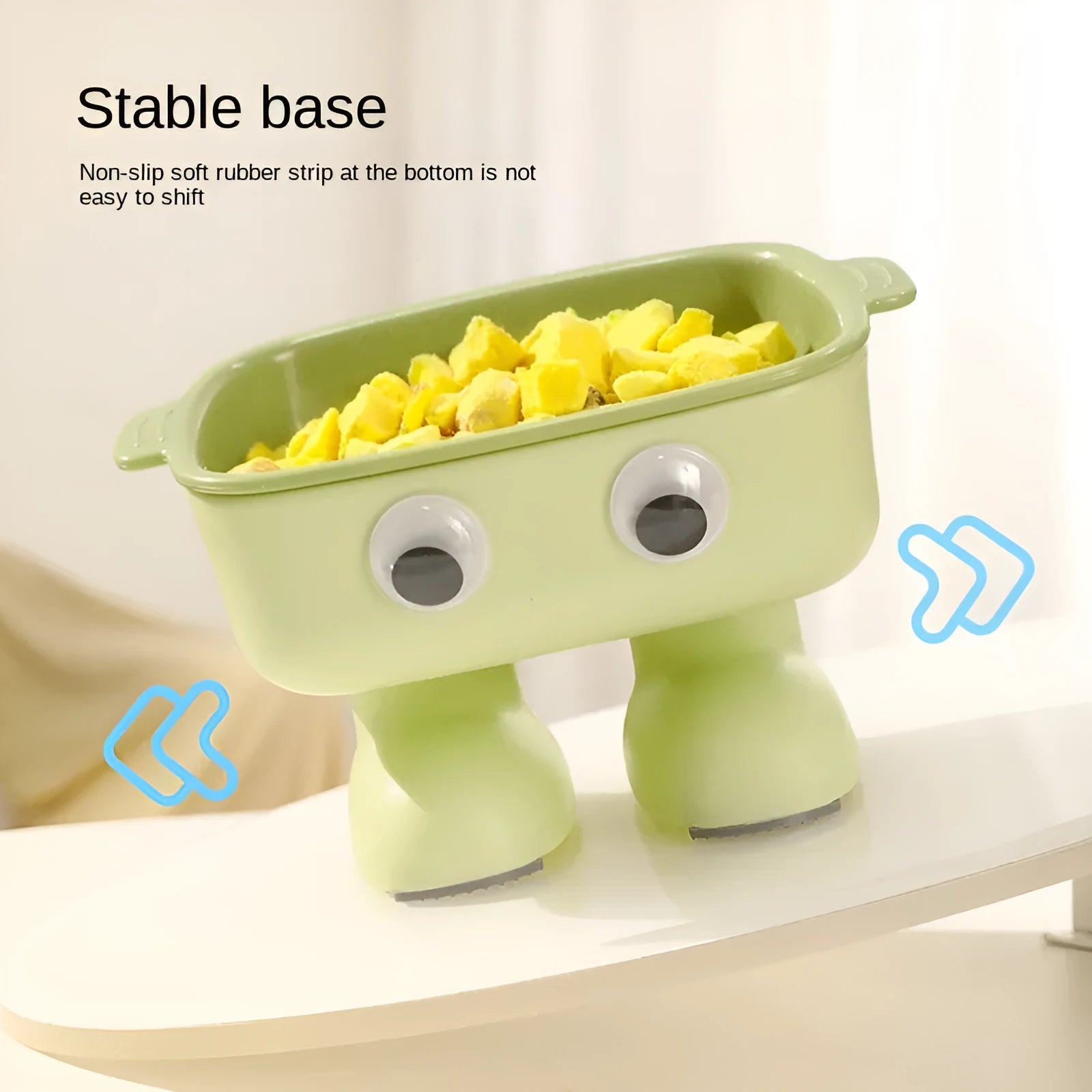 Green robot-shaped elevated cat bowl with tilted design and detachable inner food container