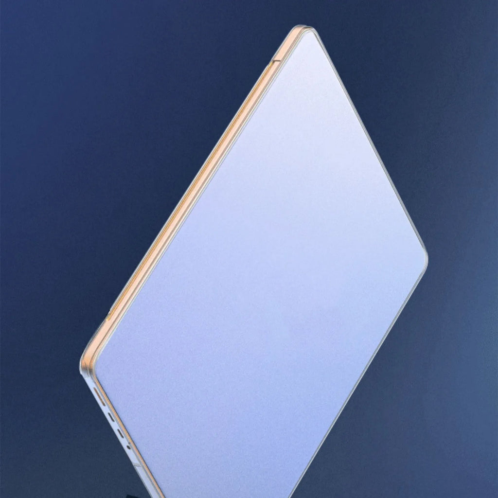 Frosted transparent MacBook protective case showing four-corner coverage and included keyboard film