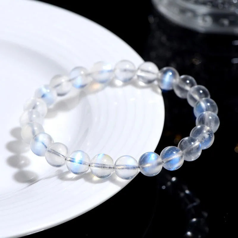 Natural cream body blue moonlight crystal bracelet with grinding treatment and unisex design