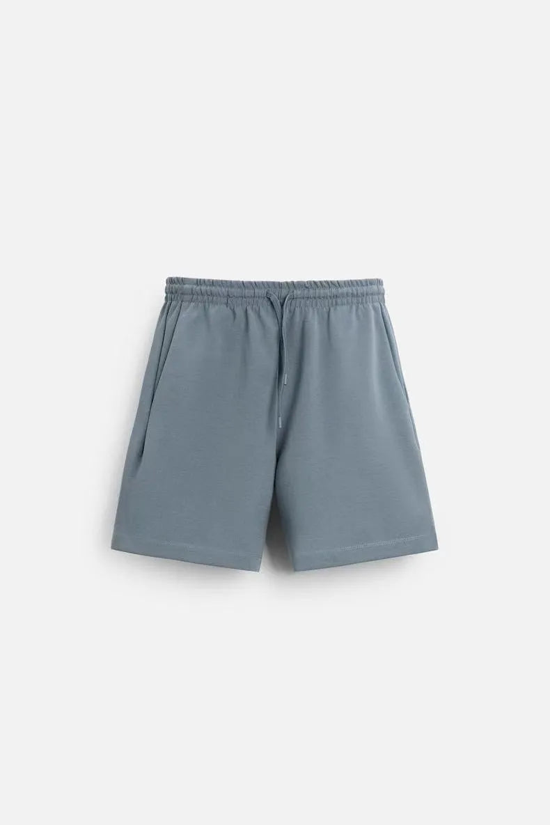 Loose double-sided cloth texture short sleeve top and shorts set in blue, showing round collar and loose fit