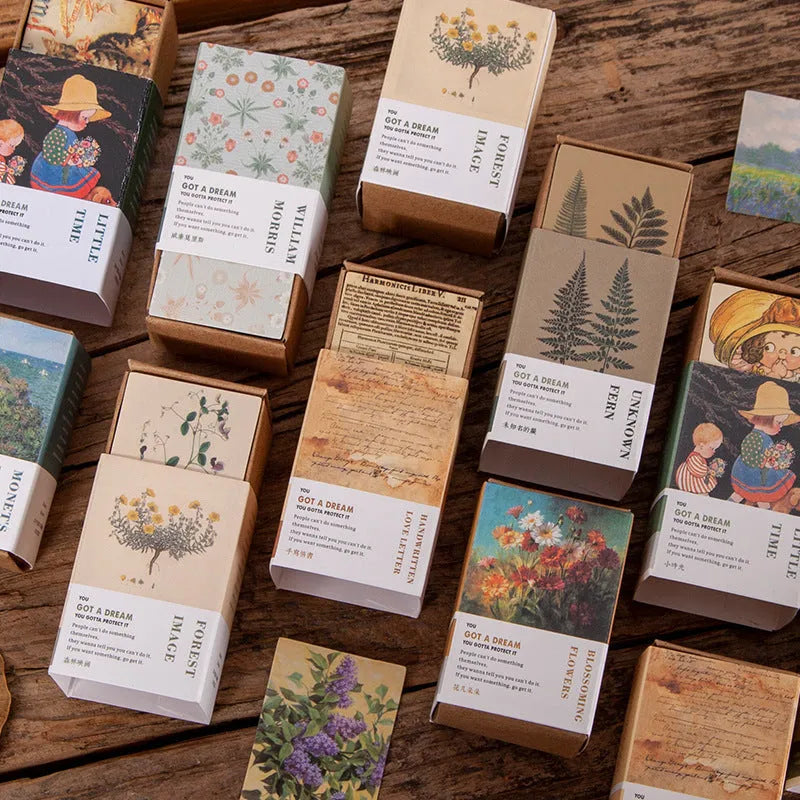A pack of 100 double-sided retro mini note cards in seven vintage colours including antique paper and forest movie.