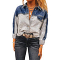 Women's loose fit denim coat with a row of silver buckle closures on the front.