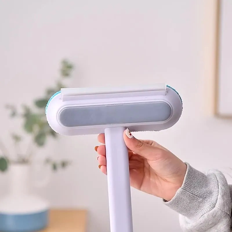 Multifunctional hair removal brush with flannel head and extension handle for cleaning pet hair, lint, and window screens.