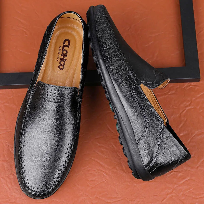 Men's brown leather casual shoes with round toe and flat heel design on rubber sole