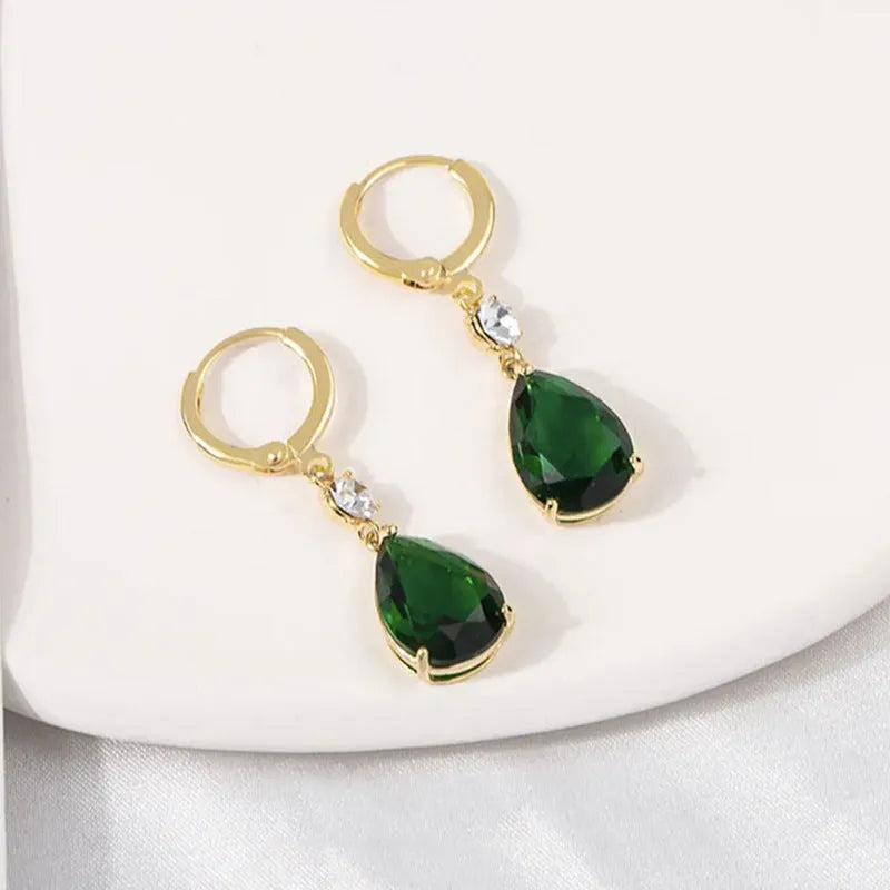 Geometric teardrop earrings in green colour with alloy construction, measuring 3 cm in length