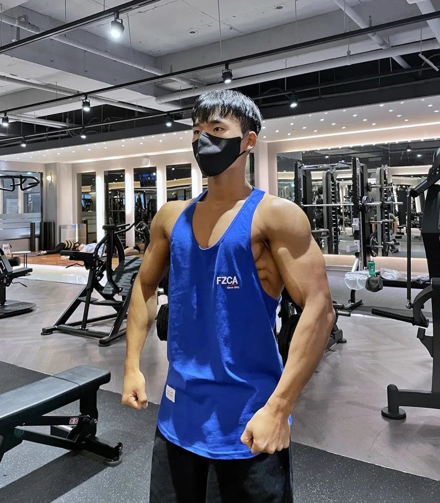 Men's cotton fitness vest in various colours for summer running and training activities