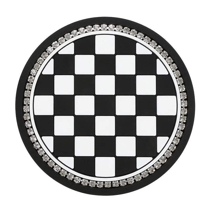 Black and white checkerboard plastic car cup mat placed in a vehicle door slot.
