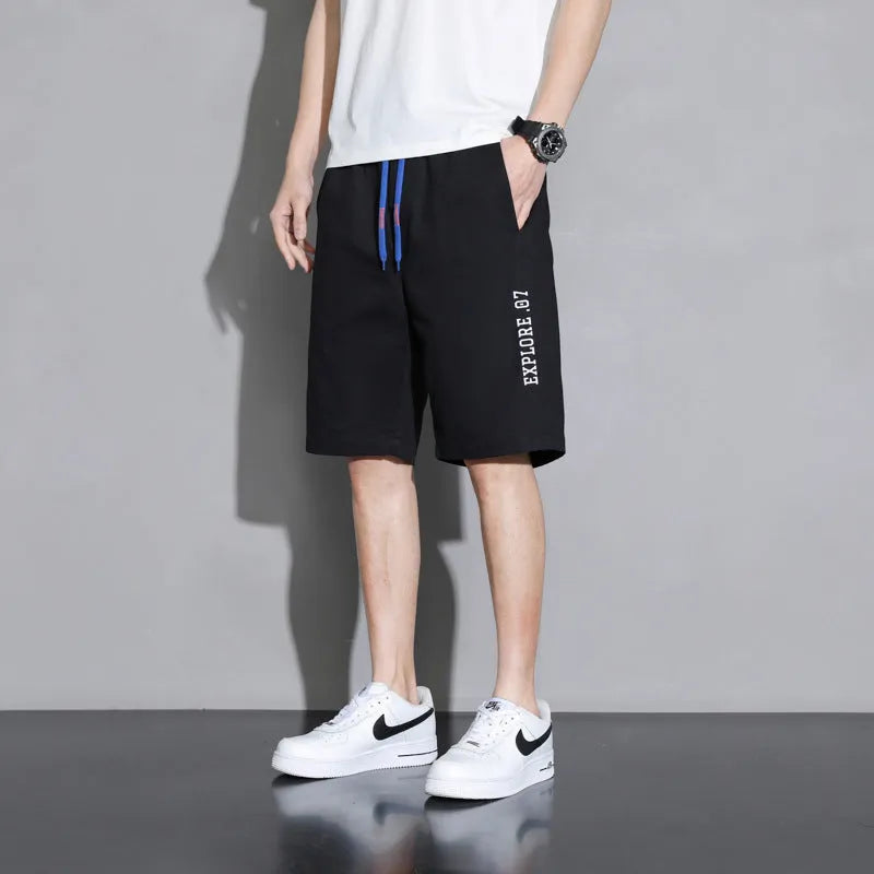 Cotton shorts for boys in black, khaki, or white with mid-waist design and shorts length