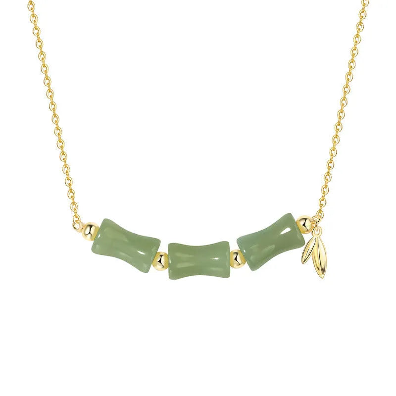 Chinese bamboo jade bracelet and necklace set with green jade details and safety clasp