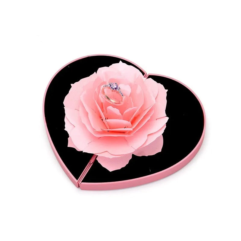 Rotating heart-shaped ring box with 3D rose decoration in red colour