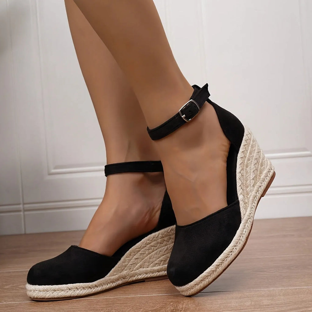 Women's suede wedge sandals in Roman style with buckle fastening and rubber sole