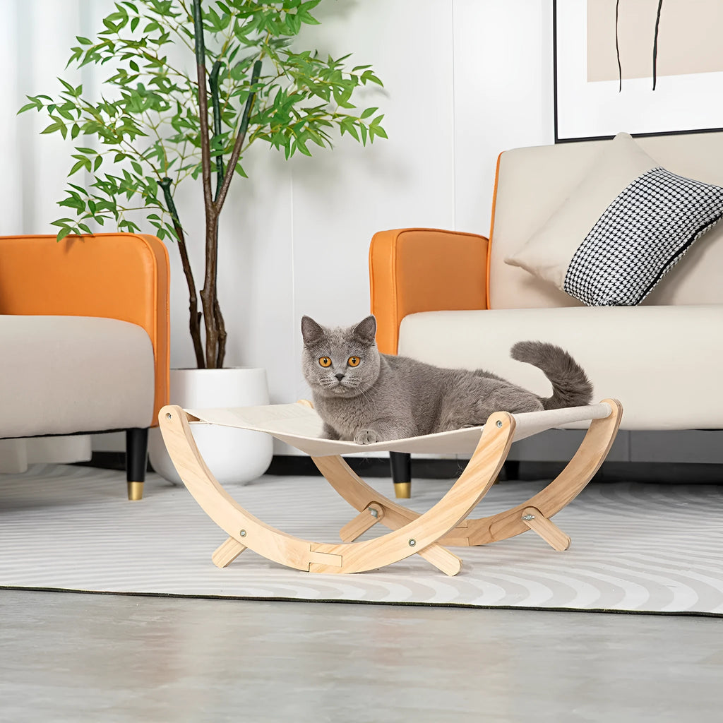 Brown wooden cat hammock bed with canvas exterior and plush interior, folded frame design