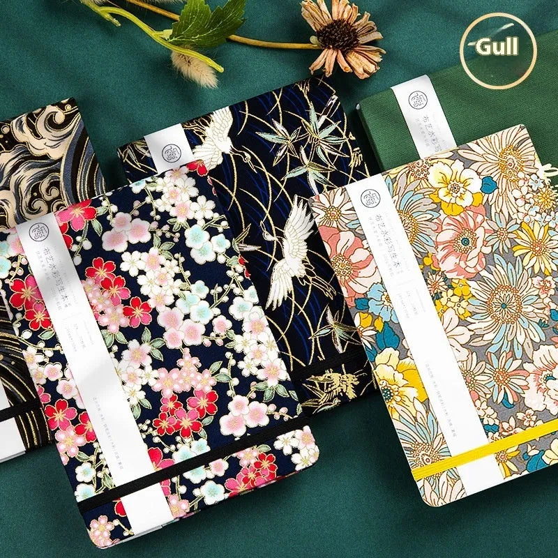 Feiluniao watercolour notebook with handmade fabric cover, 185mm length, showing Dunhuang design