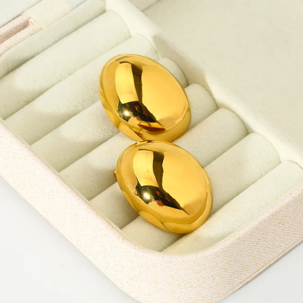 Geometric stainless steel ear studs with 18K gold plating and exaggerated glazed surface in DFE139 colour