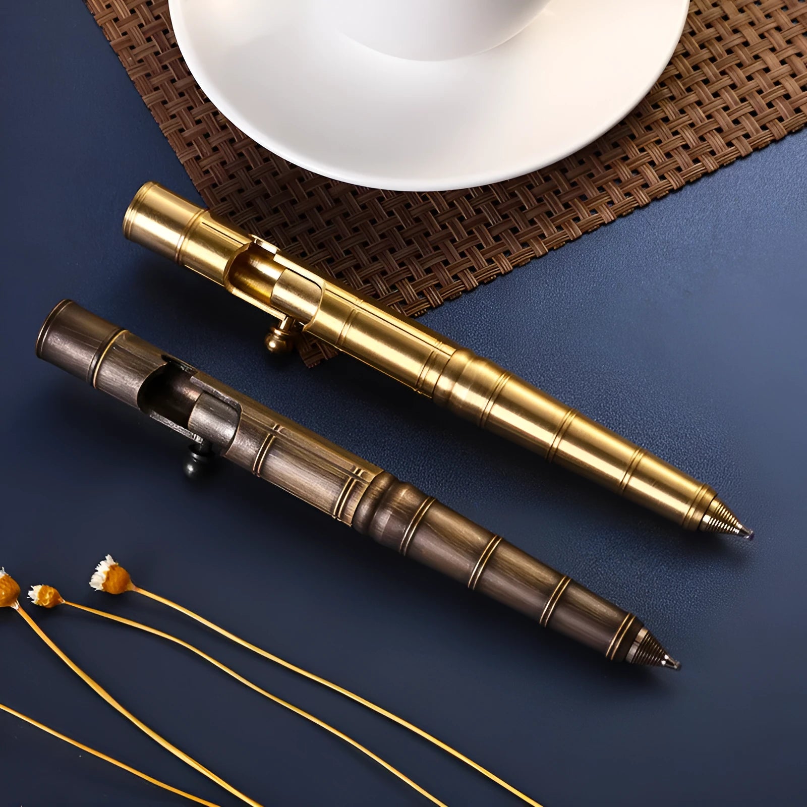 Solid brass bolt-action tactical pen shown in a brass finish with a cylindrical barrel.