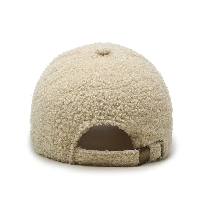 Adjustable winter baseball cap in polyester fabric with machine embroidery detailing
