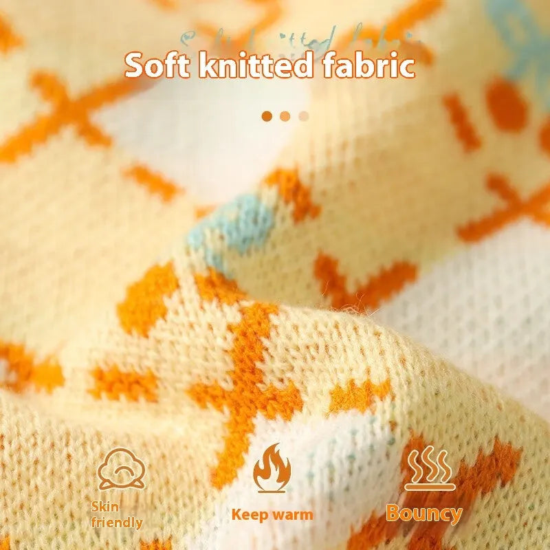 Orange knitted cat sweater with a cherry pattern, sized for small to large cats in autumn and winter.