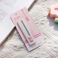 Small plastic-bladed art knife in blue, khaki, orange, pink, and purple colours, showing 7.2 cm size.