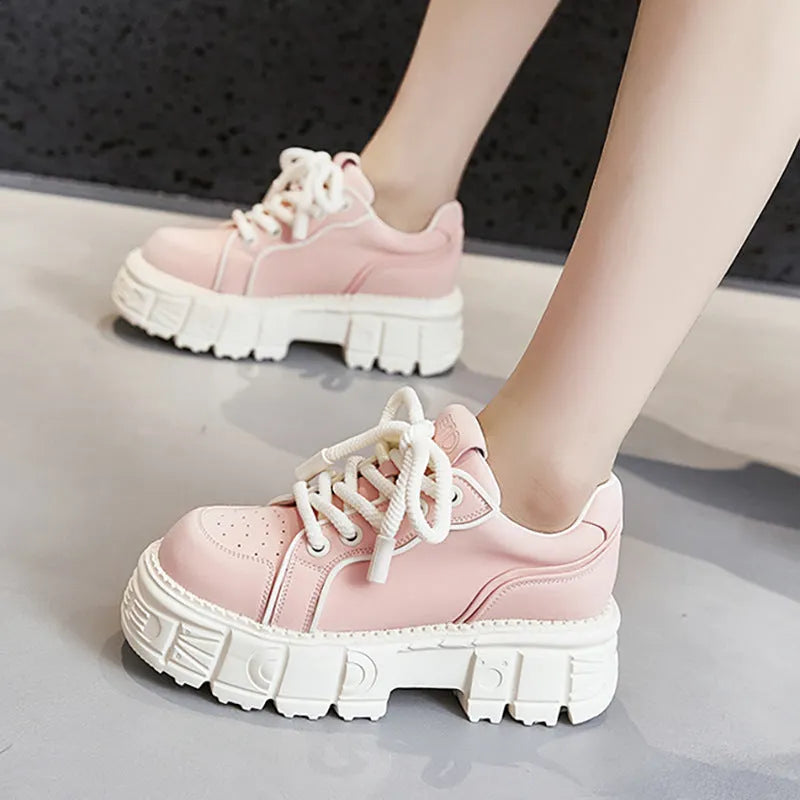 Beige muffin bottom leather shoes with 3cm rubber foam sole on a neutral background