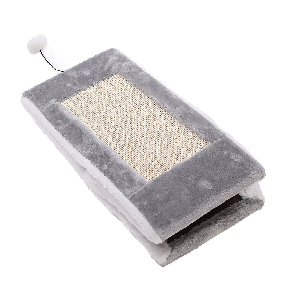 Triangle-shaped cat toy with sisal scratching surfaces and a soft plate fur bed, measuring 50cm tall