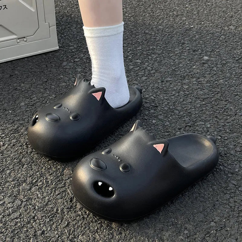White women's EVA sandal slippers with a black puppy motif on the closed toe cap.