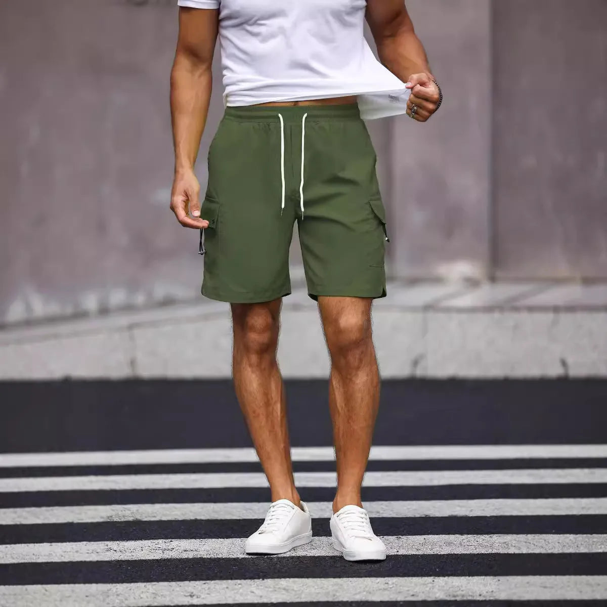 Men's workwear shorts in army green with straight-leg design and elastic waistband