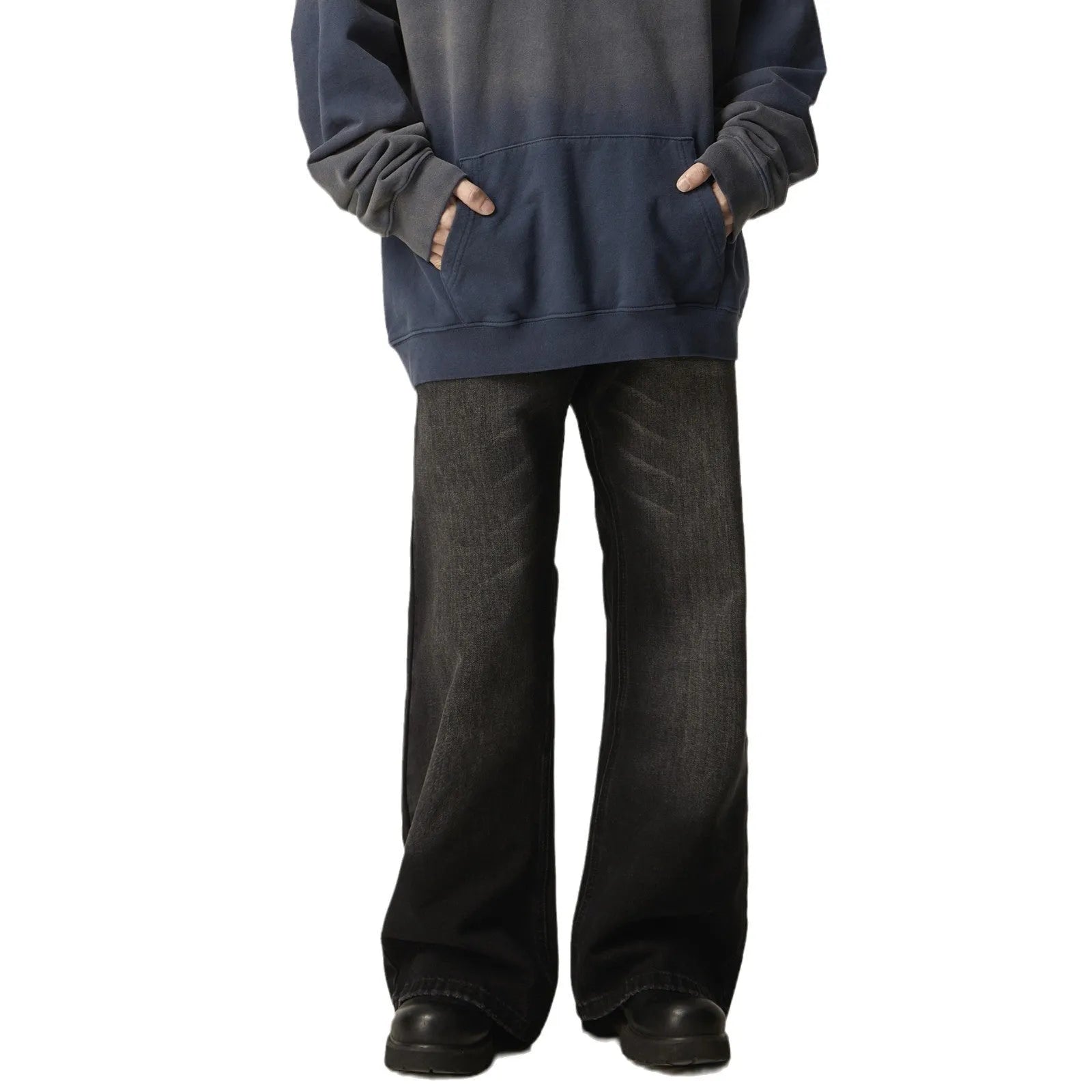 Black loose straight jeans with zipper fly on mannequin showing retro style and structured fit