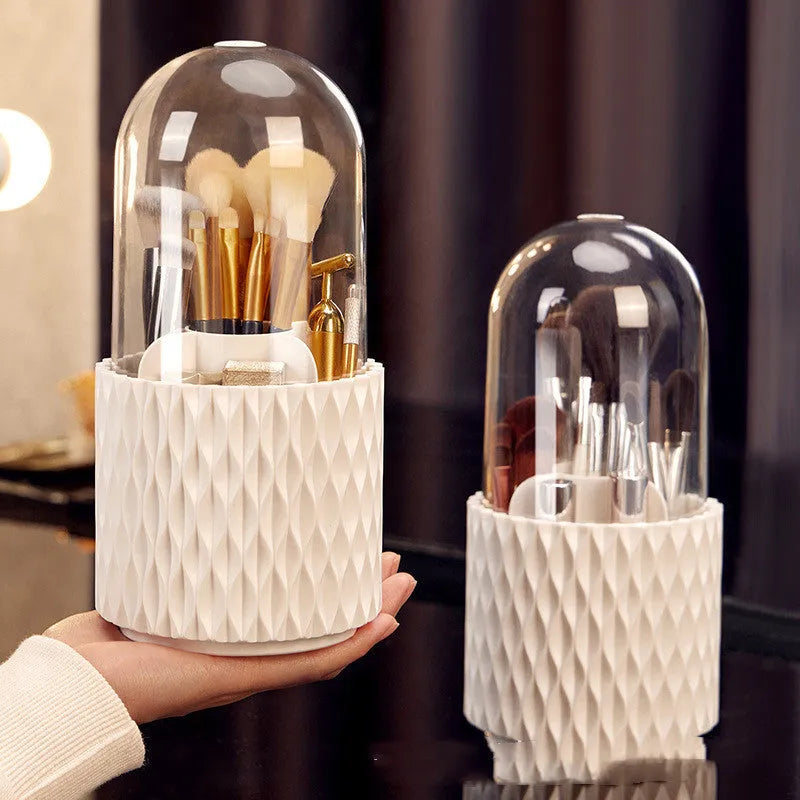 White rotating acrylic makeup brush storage box with transparent lid on desktop