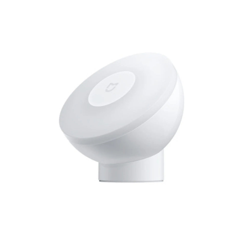 White Mijia Night Light 2 Bluetooth bedside lamp with human body induction, 94mm width, on wooden table