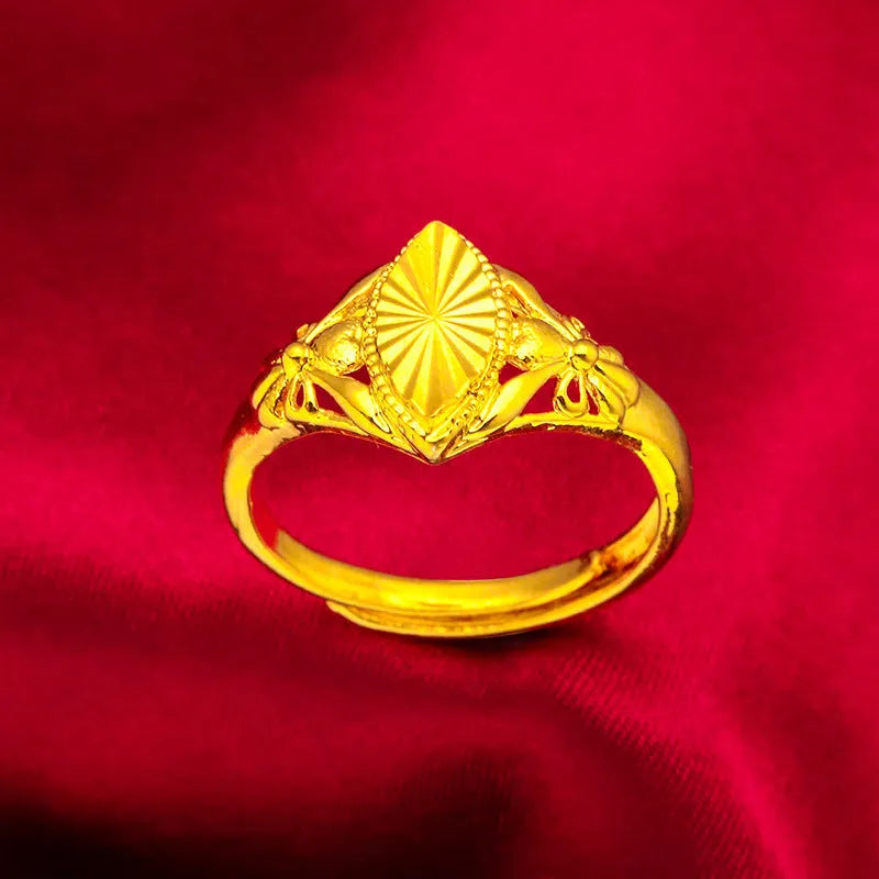 Gold geometric flower ring with textured surface and open adjustable band design