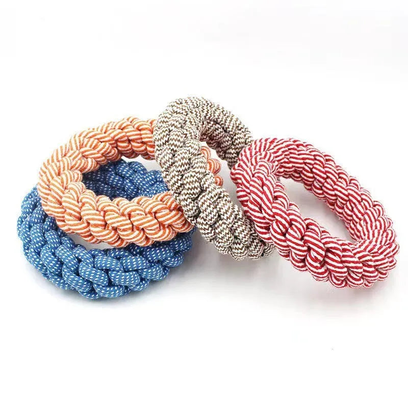 Cotton braided ring dog chew toy showing textured knots and 18cm diameter