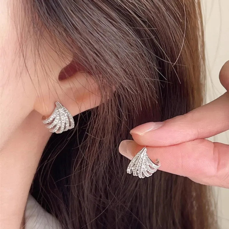 Geometric line design earrings with platinum finish and zircon material for women