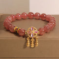 Strawberry quartz women's bracelet with four leaf clover dream catcher design and ball pendant charm
