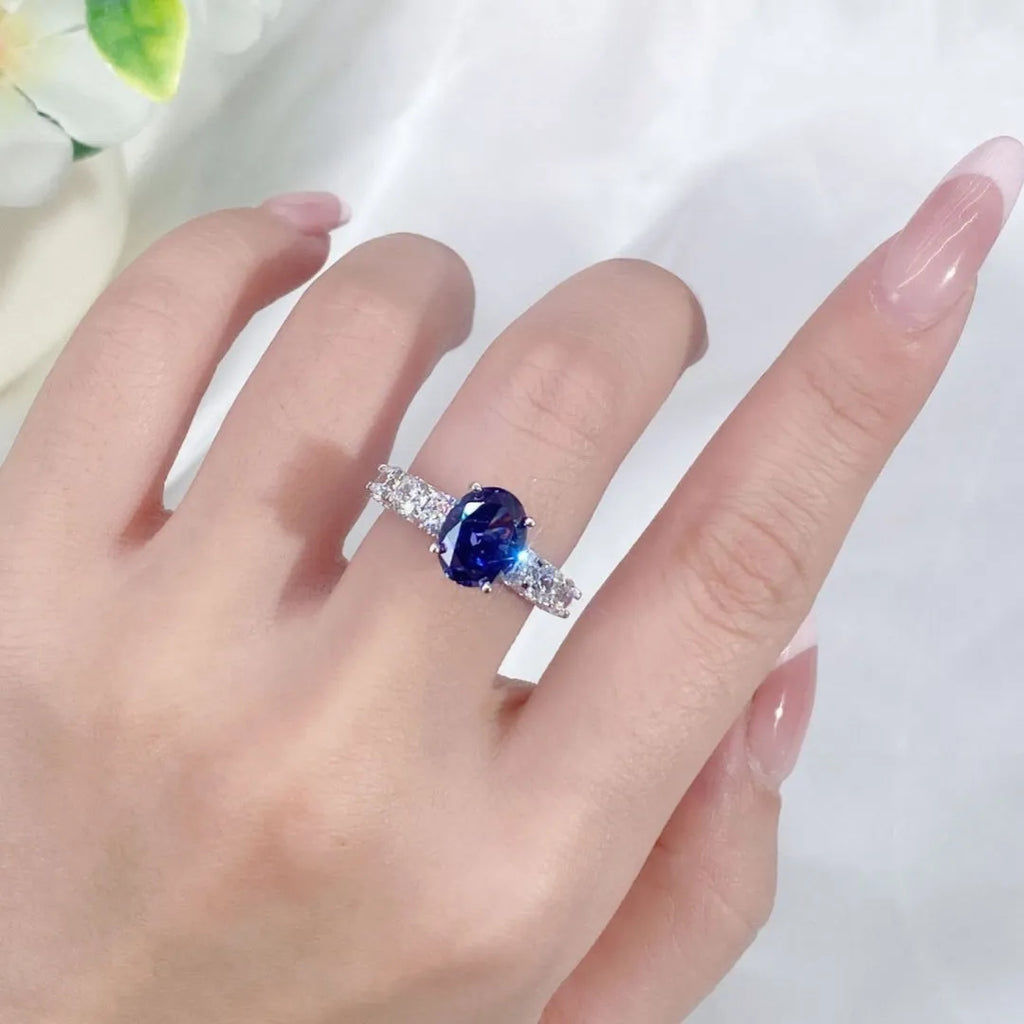 Heart-shaped sterling silver ring with zircon stone in tan sang colour, showing side profile and front view