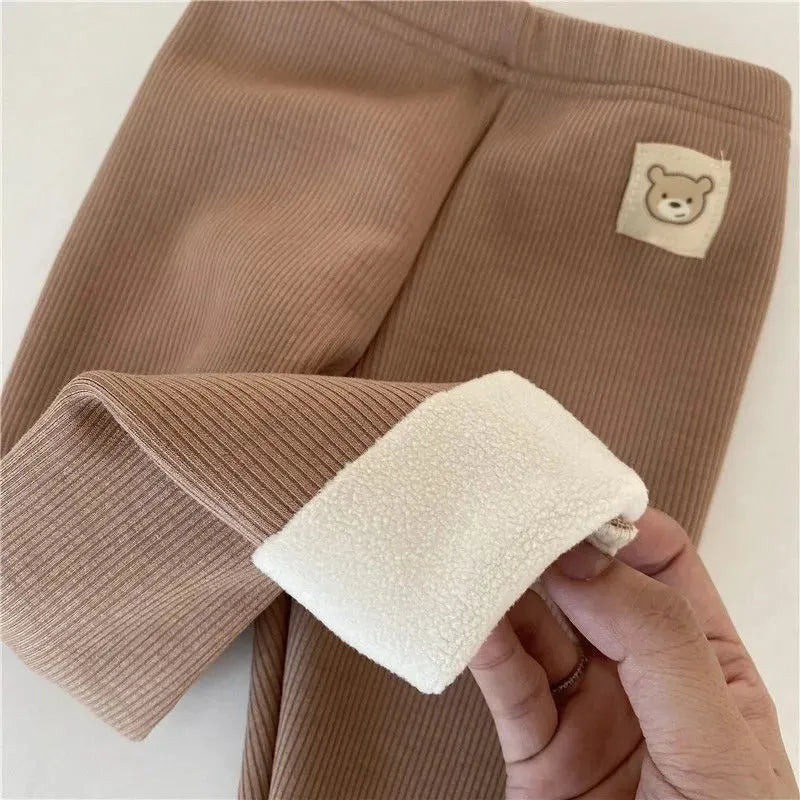 Girls' high-waist fleece-lined leggings in beige, black, brown, or grey colour.