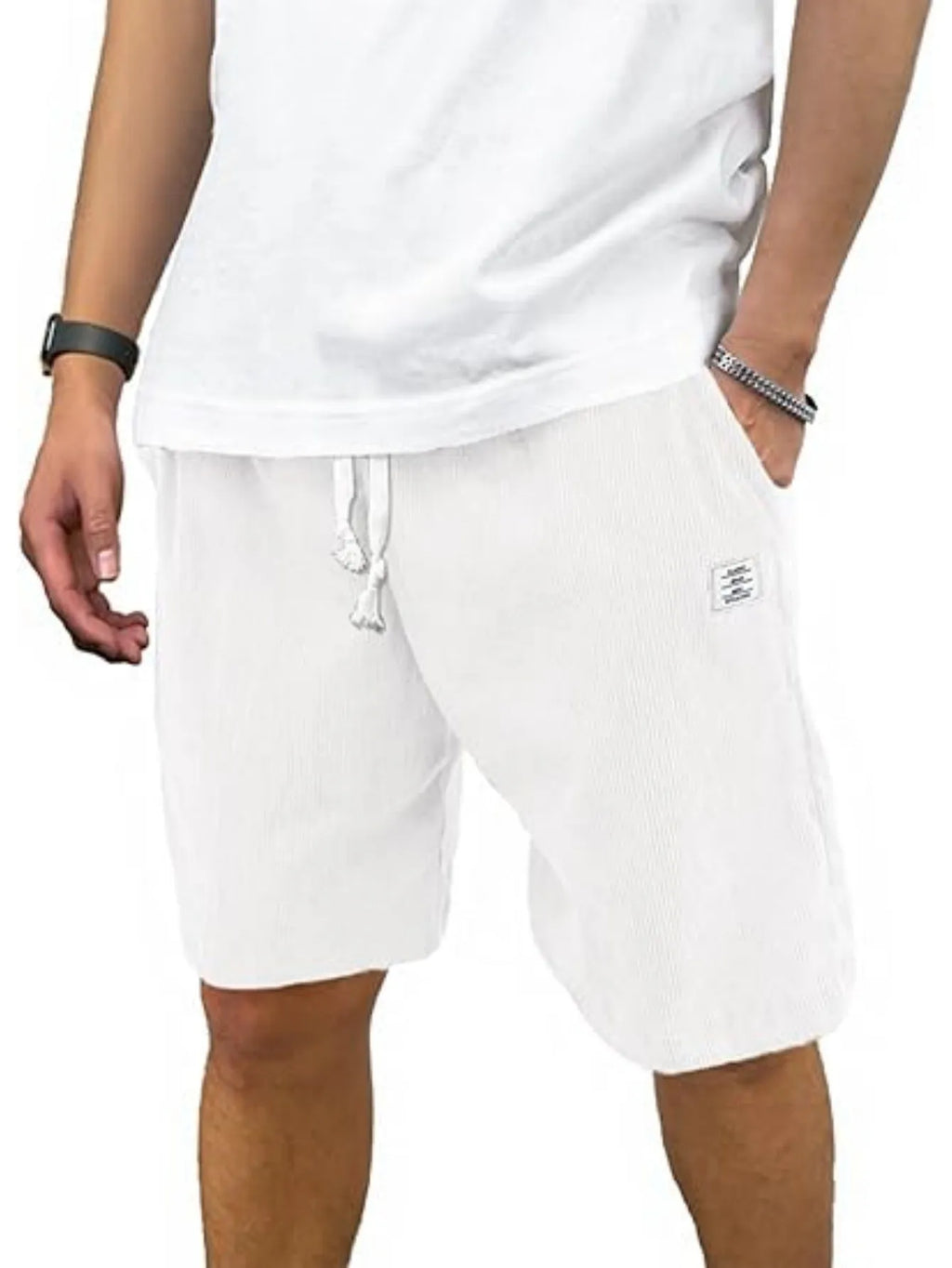 Men's straight-leg corduroy sports shorts in army green colour, showing texture and fit.