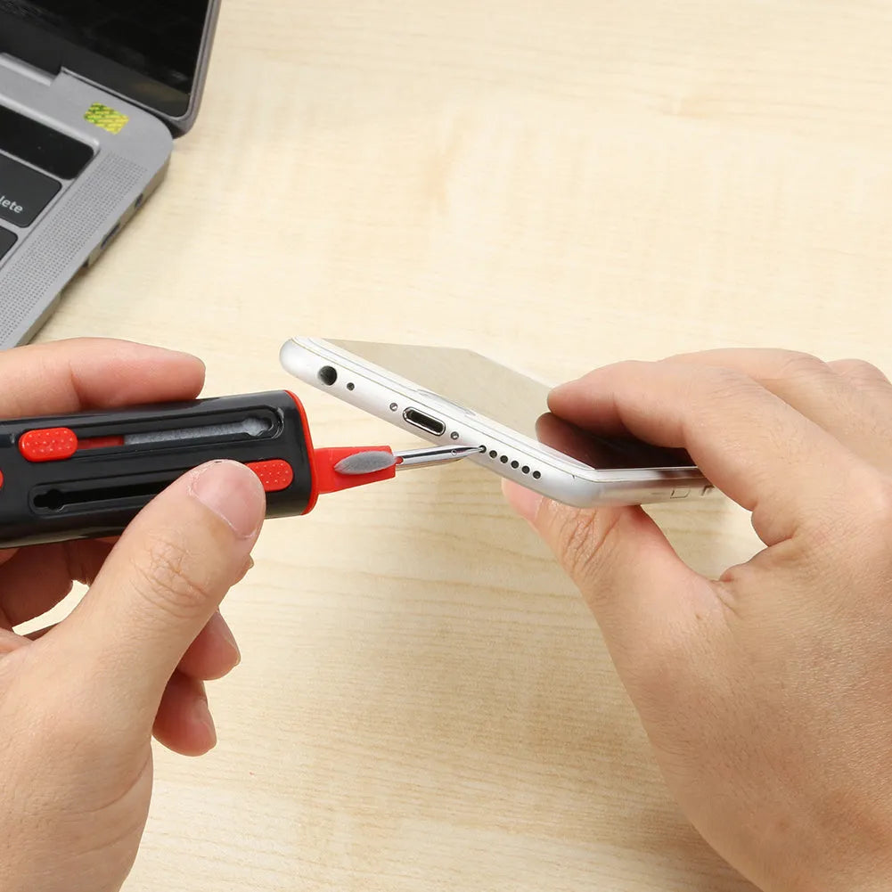 White and red cleaning pen for AirPods Pro with multiple heads including a brush and metal nib.