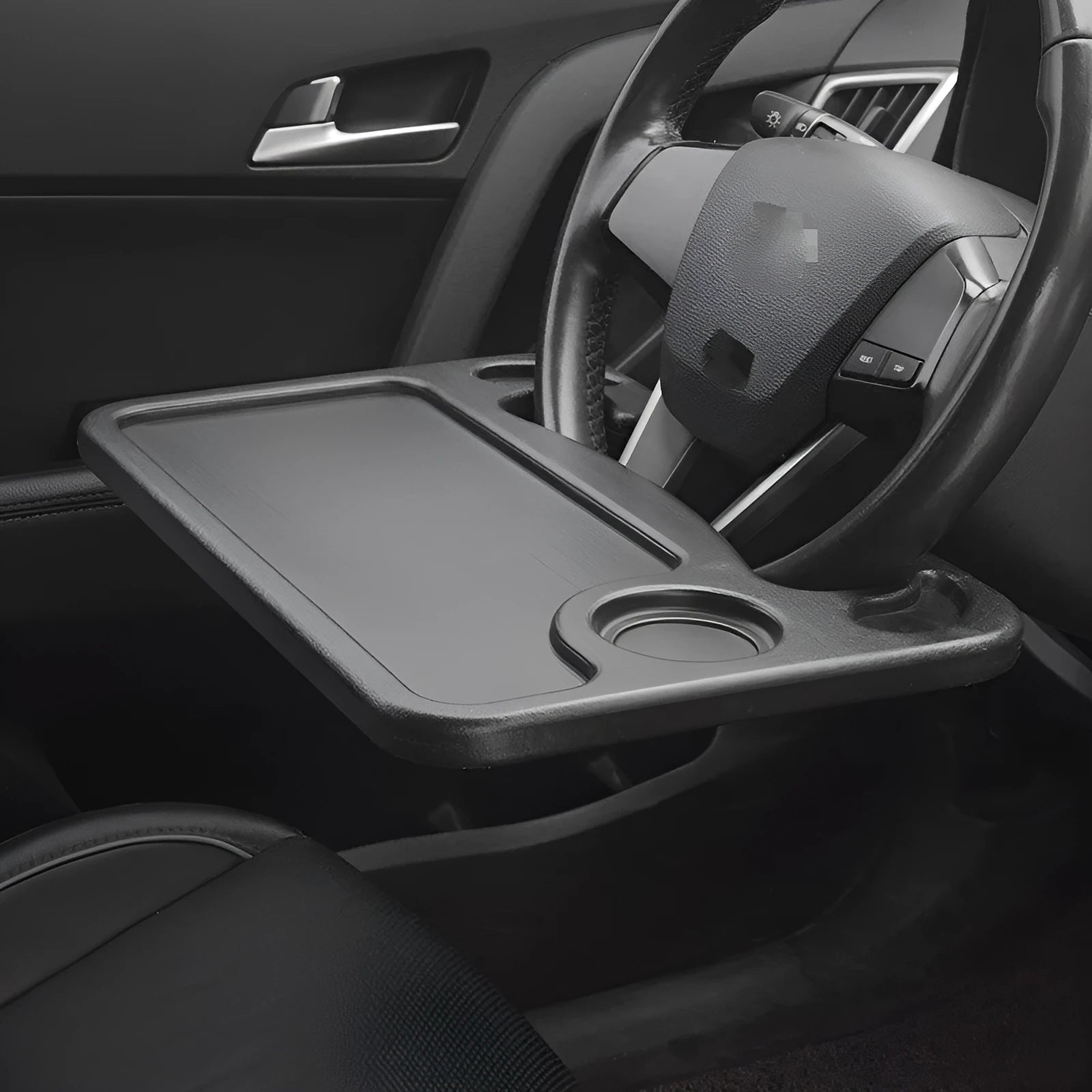 Black foldable plastic car desk measuring 42 by 28 centimetres, shown as a multifunctional vehicle tray